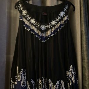 Advance Apparel—Tie-dye sleeveless colors are black white and navy